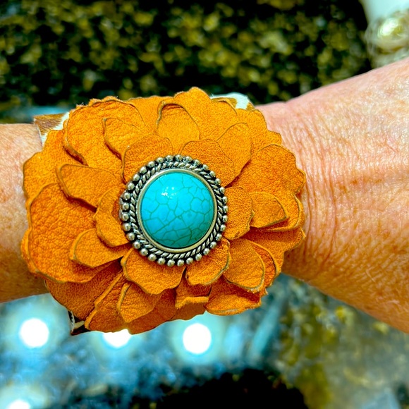 Hide cuff with giraffe print, burnt orange suede flower with turquoise detail. - Picture 1 of 4